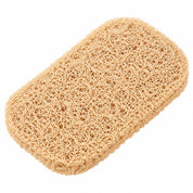 Single beige rectangular soap saver pad with rounded corners and a thick, loosely woven, loofah-like texture, shown diagonally against a clean white background.