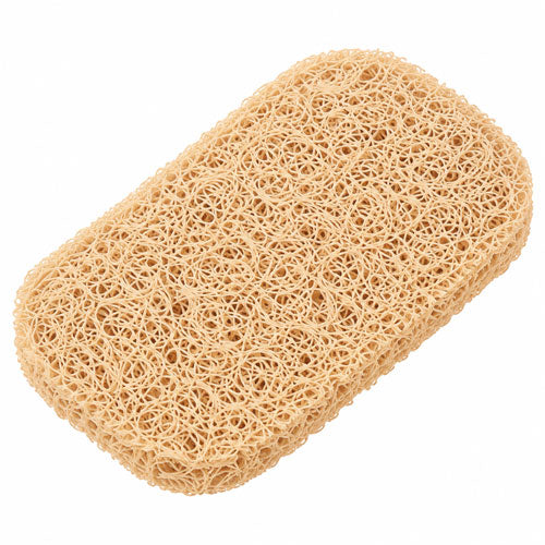 Single beige rectangular soap saver pad with rounded corners and a thick, loosely woven, loofah-like texture, shown diagonally against a clean white background.