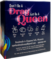 Back of the Ope! It’s Soap Don’t Be a Drag soap box featuring the phrase “Don’t Be a Drag, Just Be a Queen” in sparkling pink lettering with illustrated icons for olive oil, coconut oil, castor oil, avocado oil, and shea butter.