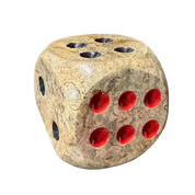 A textured, fossilized coral, stone-like die with a beige and brown marbled surface and bright red circular cutouts on the visible faces, isolated on a white background.