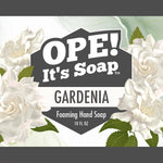 Gardenias surrounding gardenia soap label