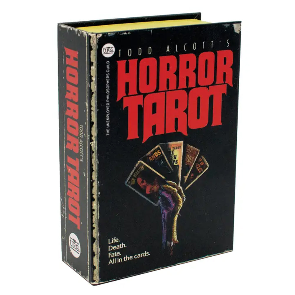 Todd Alcott's Horror Tarot deck in its original illustrated box, featuring a black cover with bold red title text and a hand holding tarot cards.