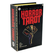 Todd Alcott's Horror Tarot deck in its original illustrated box, featuring a black cover with bold red title text and a hand holding tarot cards.