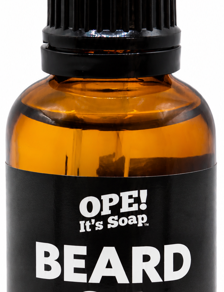 Amber glass Lumberjack Beard Oil bottle with black dropper and a black and muted green Ope! It’s Soap label.