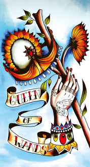 Illustration of a hand with tattoos, flowers, and a banner with 'Queen of Wands' text on a blue background.