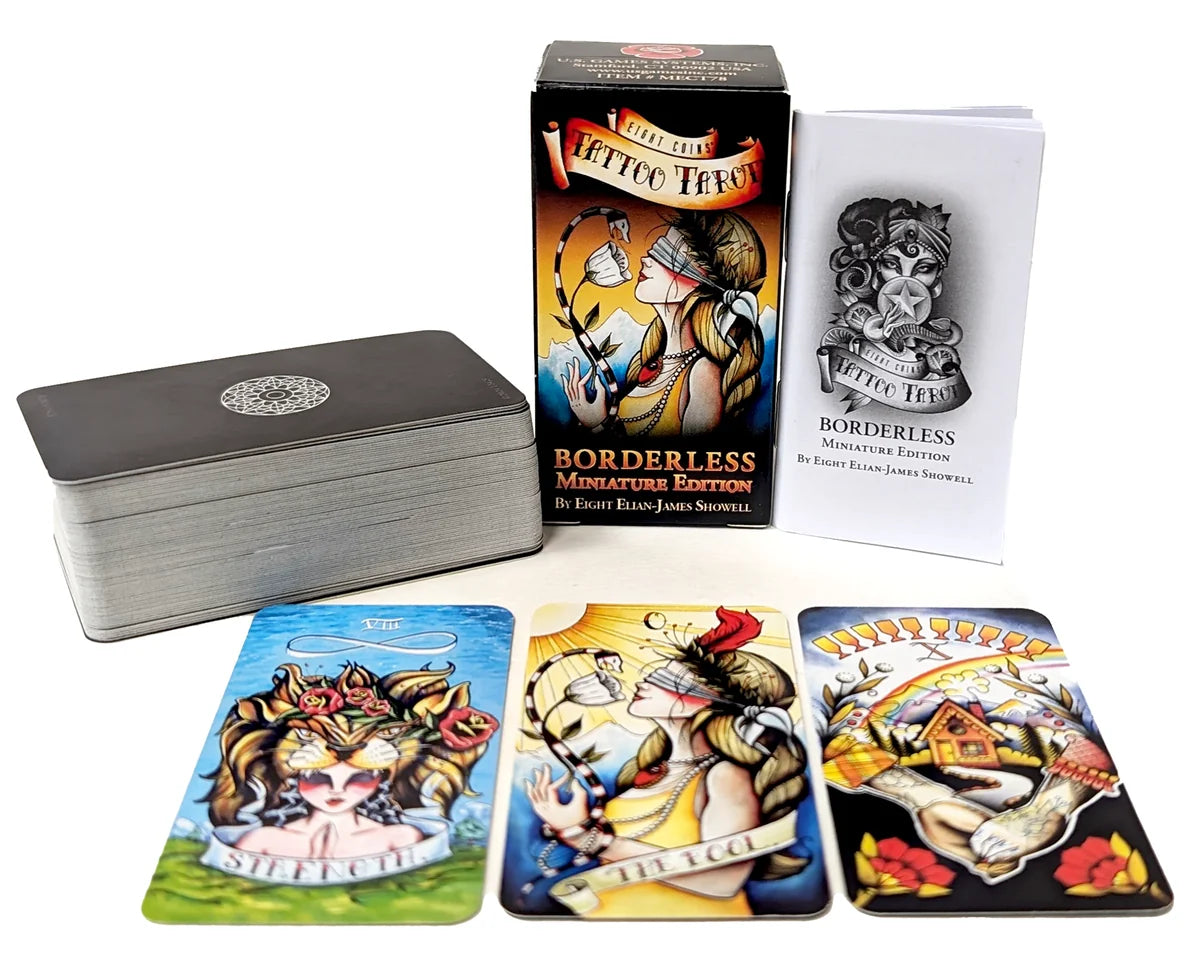 Collection of tattoo-themed playing cards with a box and card holder on a white background