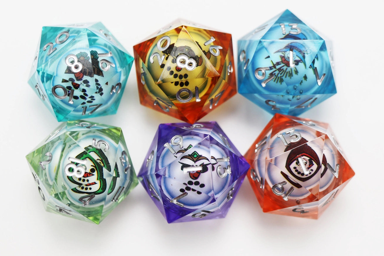Six colorful translucent resin D20 dice from Foam Brain Games Snow Quest Mystery Loot collection, featuring snowman character faces inside each die. Dice are turquoise, amber, blue, green, purple, and orange, with silver numbering, arranged on a white background.