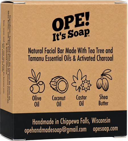 Back of the Ope! It’s Soap Natural Facial Bar box featuring tea tree and tamanu essential oils with activated charcoal, ingredient illustrations, and “Handmade in Chippewa Falls, Wisconsin.”