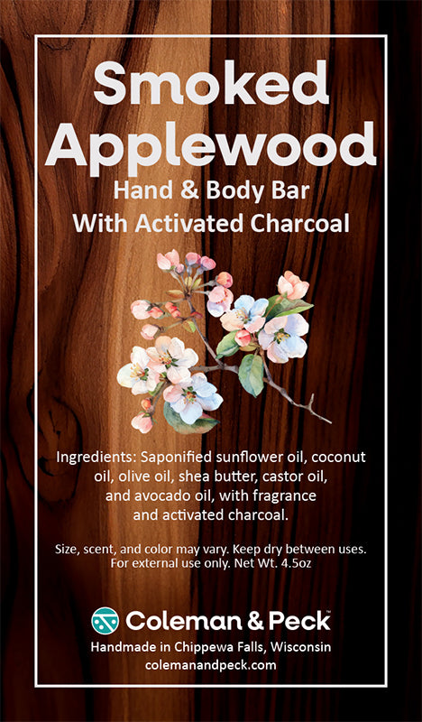 Smoked Applewood soap ingredient card featuring a vector wood background with apple blossoms.