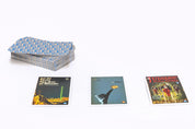 Collection of playing cards with colorful designs on a white background