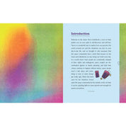 An open booklet or guidebook spread with a colorful gradient cover on the left and an introduction page on the right. The right page has the heading 'Introduction' in purple and contains a block of text plus small illustrations of two purple books and a small heart near the bottom.
