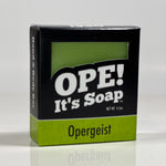 Front side of the Opergeist soap box. Box is black with green accents.