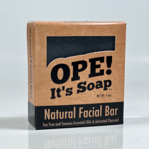 Front side of the Natural Facial Bar box. Box is kraft paper colored with black accents.