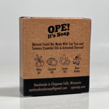 Back side of the Natural Facial Bar box. Box is kraft paper colored with black accents.
