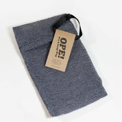 Photo of a single gray exfoliating soap bag.
